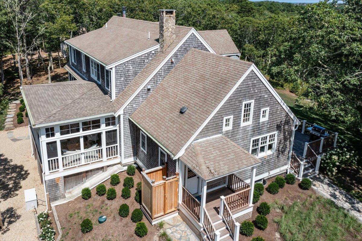 58 Slough Pond Road Truro, MA 02666 - Photo 70 of 82 an aerial view of a house with a yard and balcony