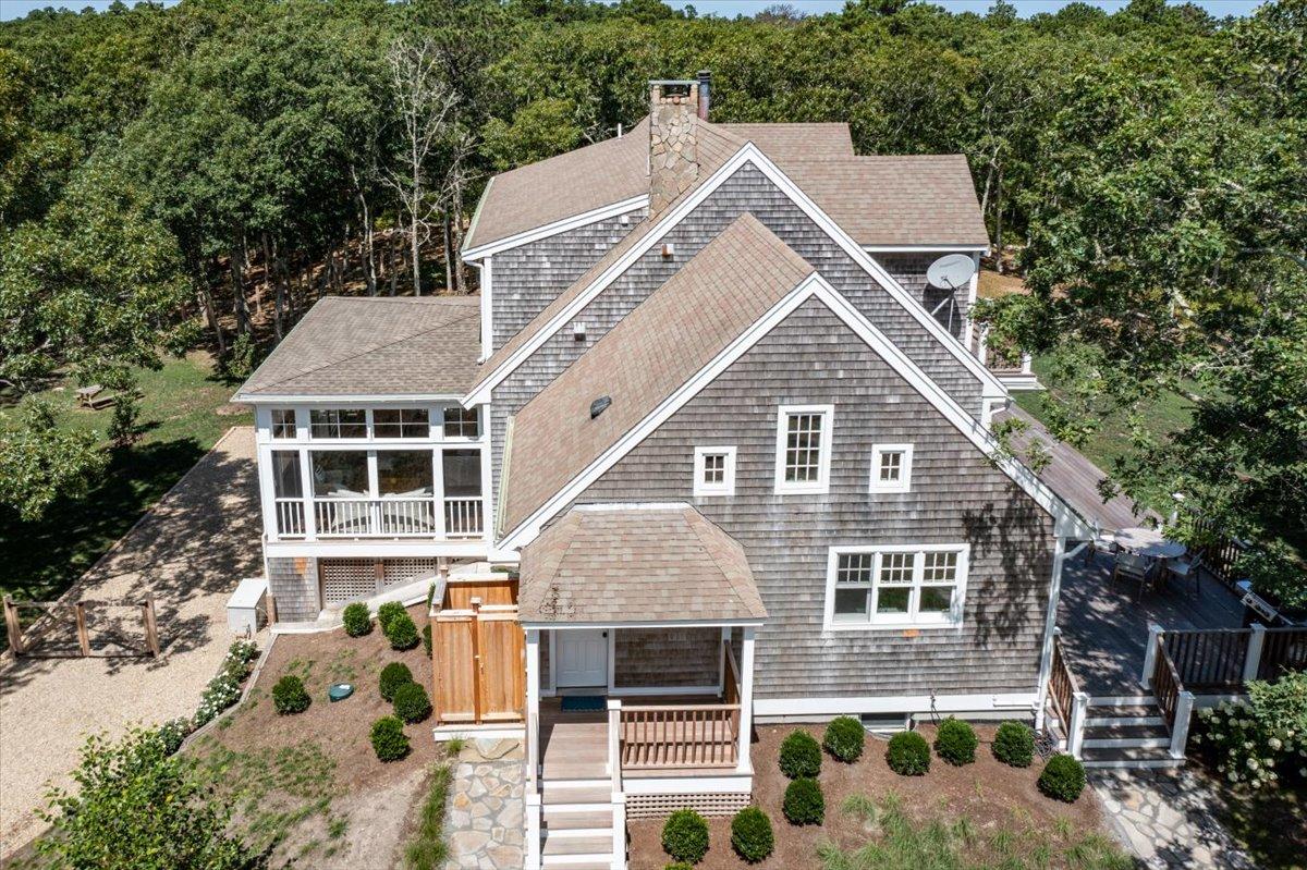 58 Slough Pond Road Truro, MA 02666 - Photo 71 of 82 a aerial view of a house with a yard