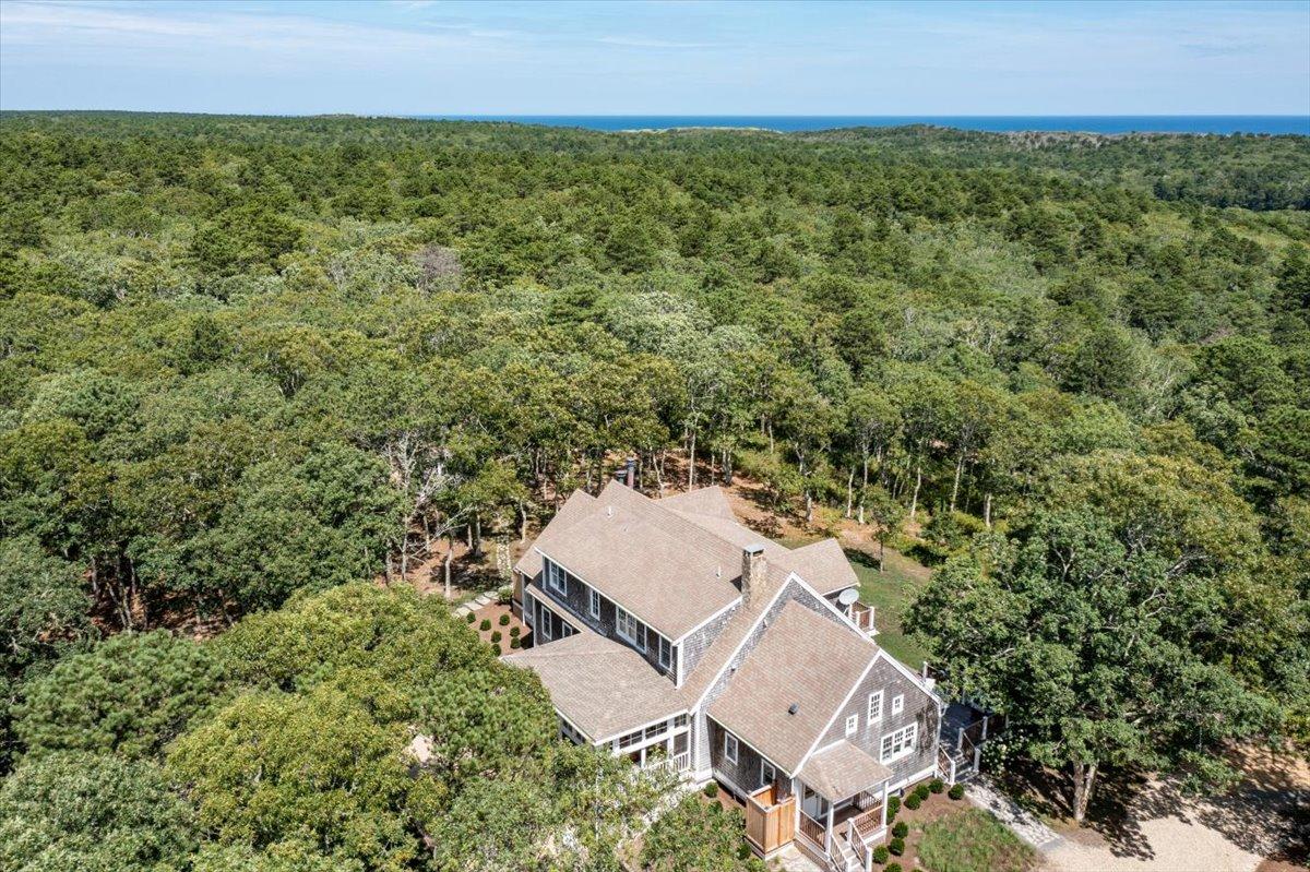 58 Slough Pond Road Truro, MA 02666 - Photo 78 of 82 an aerial view of a house with a yard