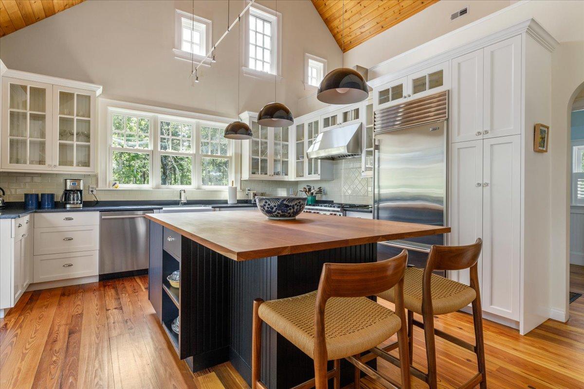 58 Slough Pond Road Truro, MA 02666 - Photo 8 of 82 a kitchen with a sink cabinets and wooden floor