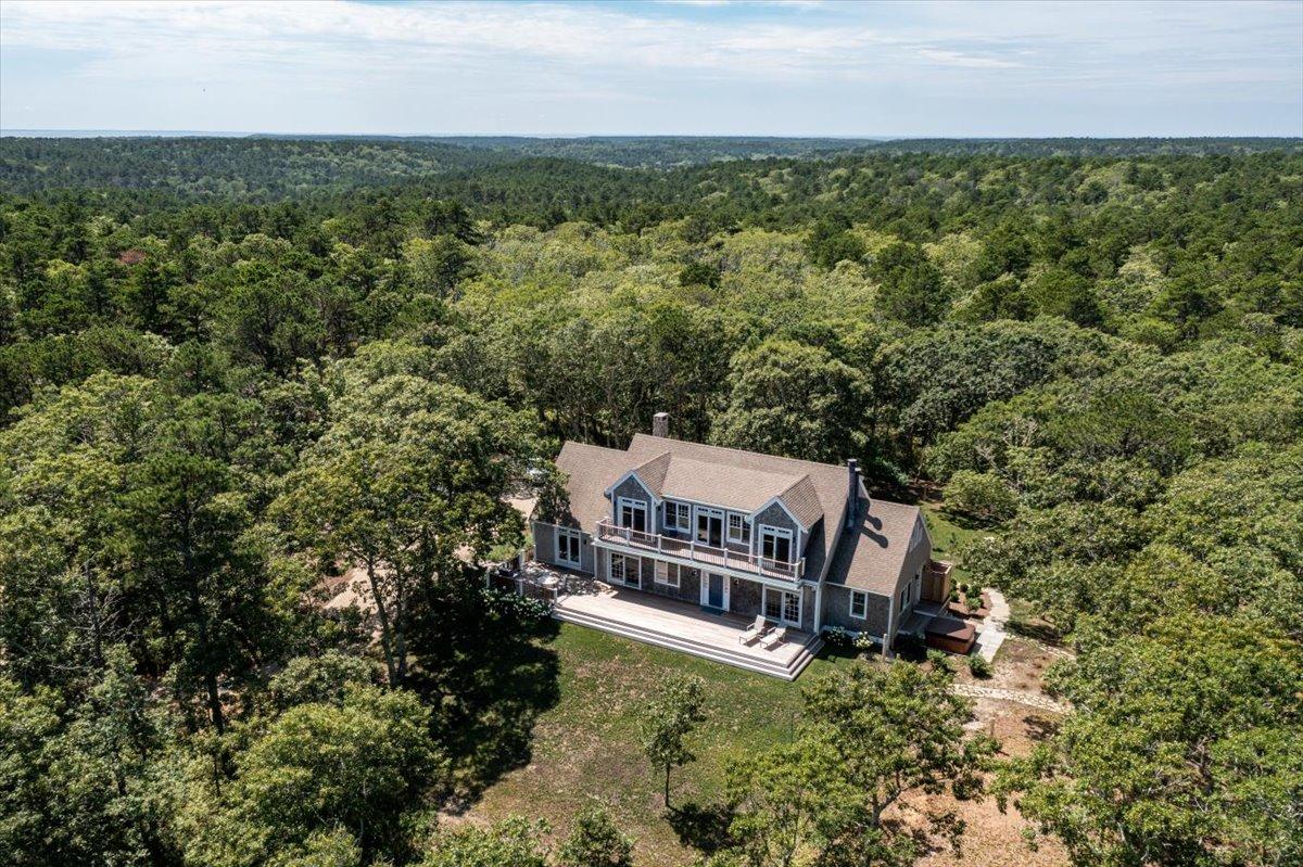 58 Slough Pond Road Truro, MA 02666 - Photo 82 of 82 an aerial view of a house with a yard