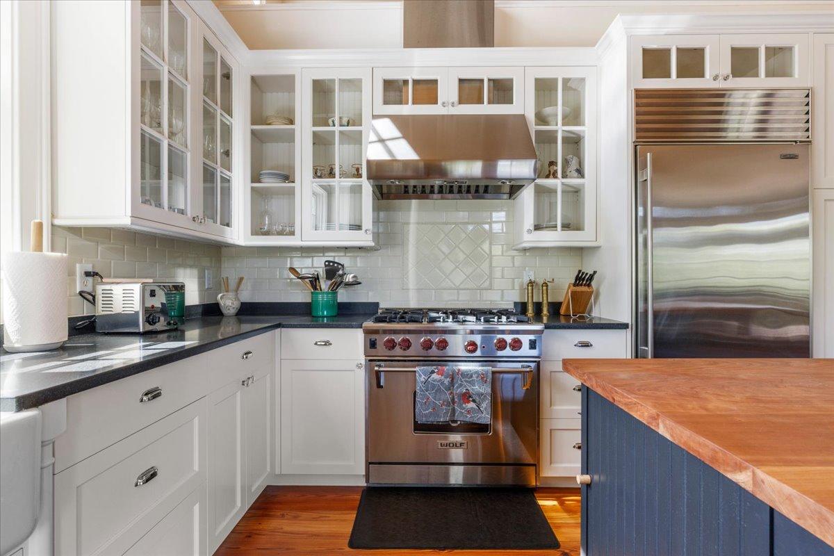 58 Slough Pond Road Truro, MA 02666 - Photo 10 of 82 a kitchen with stainless steel appliances granite countertop a stove and a sink