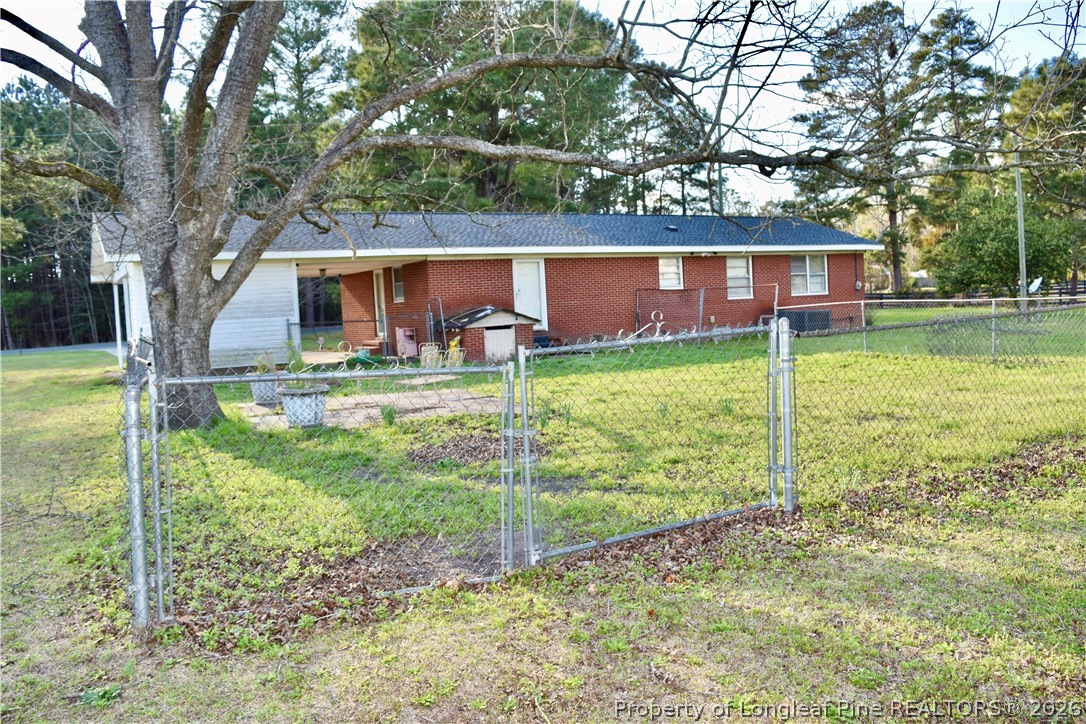 5309 Tobacco Road Orrum, NC 28369 - Photo 33 of 44 a view of a house with backyard