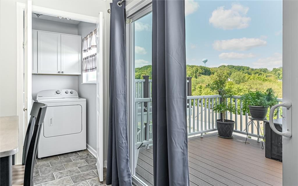 138 Rylie Drive Harmony, PA 16037 - Photo 14 of 23 a view of a hallway with washer and dryer