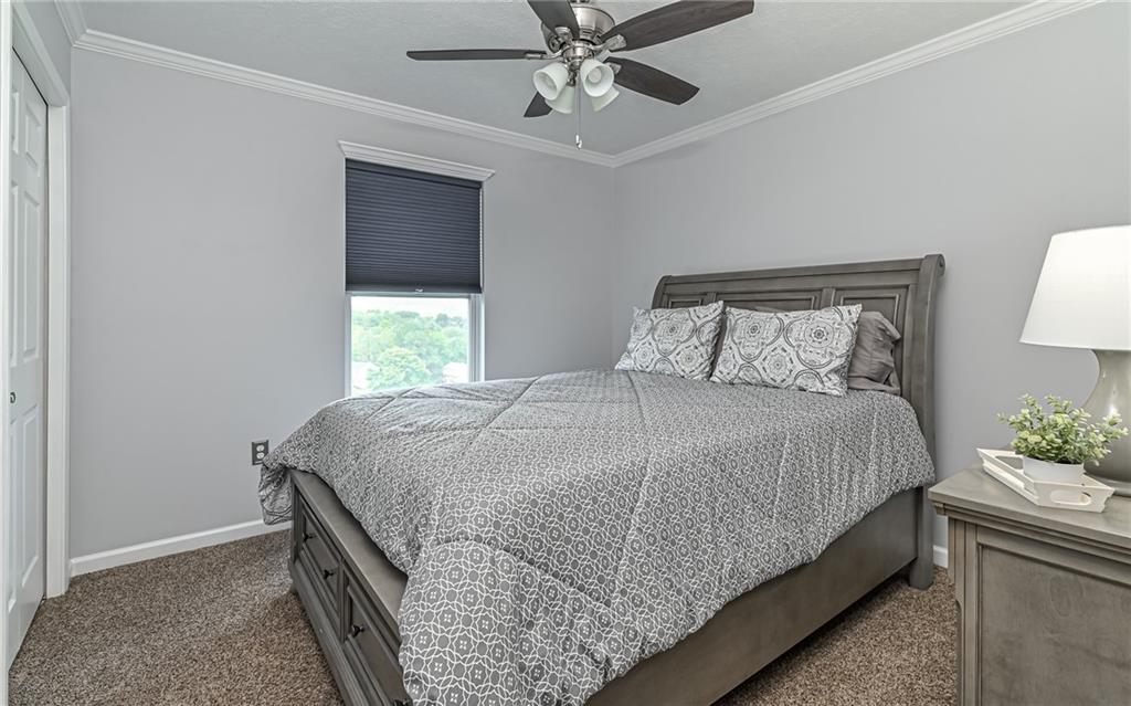 138 Rylie Drive Harmony, PA 16037 - Photo 18 of 23 a bedroom with a bed and window