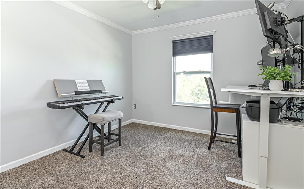 138 Rylie Drive Harmony, PA 16037 - Photo 19 of 23 a work room with furniture and a window