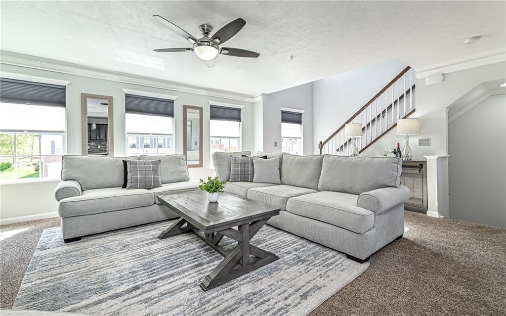 138 Rylie Drive Harmony, PA 16037 - Photo 2 of 23 a living room with furniture and a ceiling fan