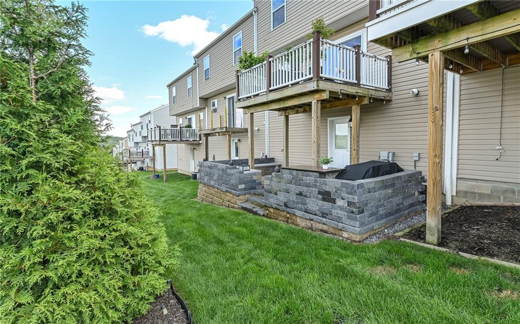 138 Rylie Drive Harmony, PA 16037 - Photo 21 of 23 a front view of a house with a garden