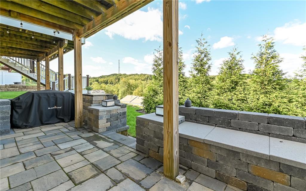 138 Rylie Drive Harmony, PA 16037 - Photo 22 of 23 a view of a porch with furniture and garden
