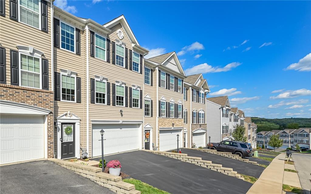 138 Rylie Drive Harmony, PA 16037 - Photo 23 of 23 a front view of a building with a street view