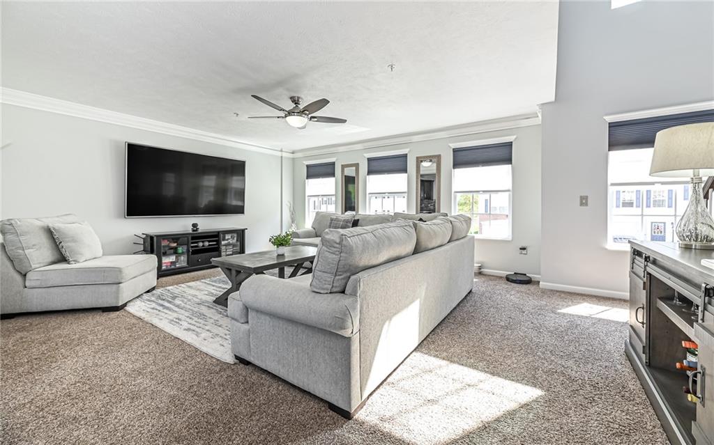138 Rylie Drive Harmony, PA 16037 - Photo 4 of 23 a living room with furniture and a flat screen tv