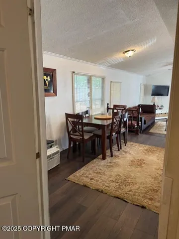 a view of a refrigerator in kitchen