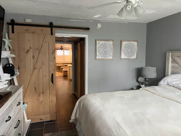 a room with furniture and a flat screen tv