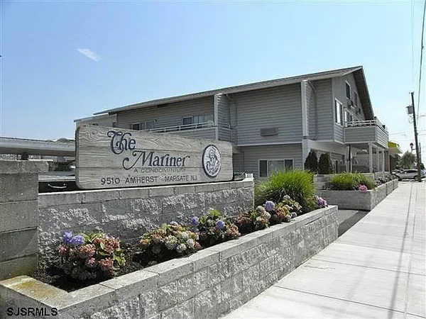 a front view of a house with a garage