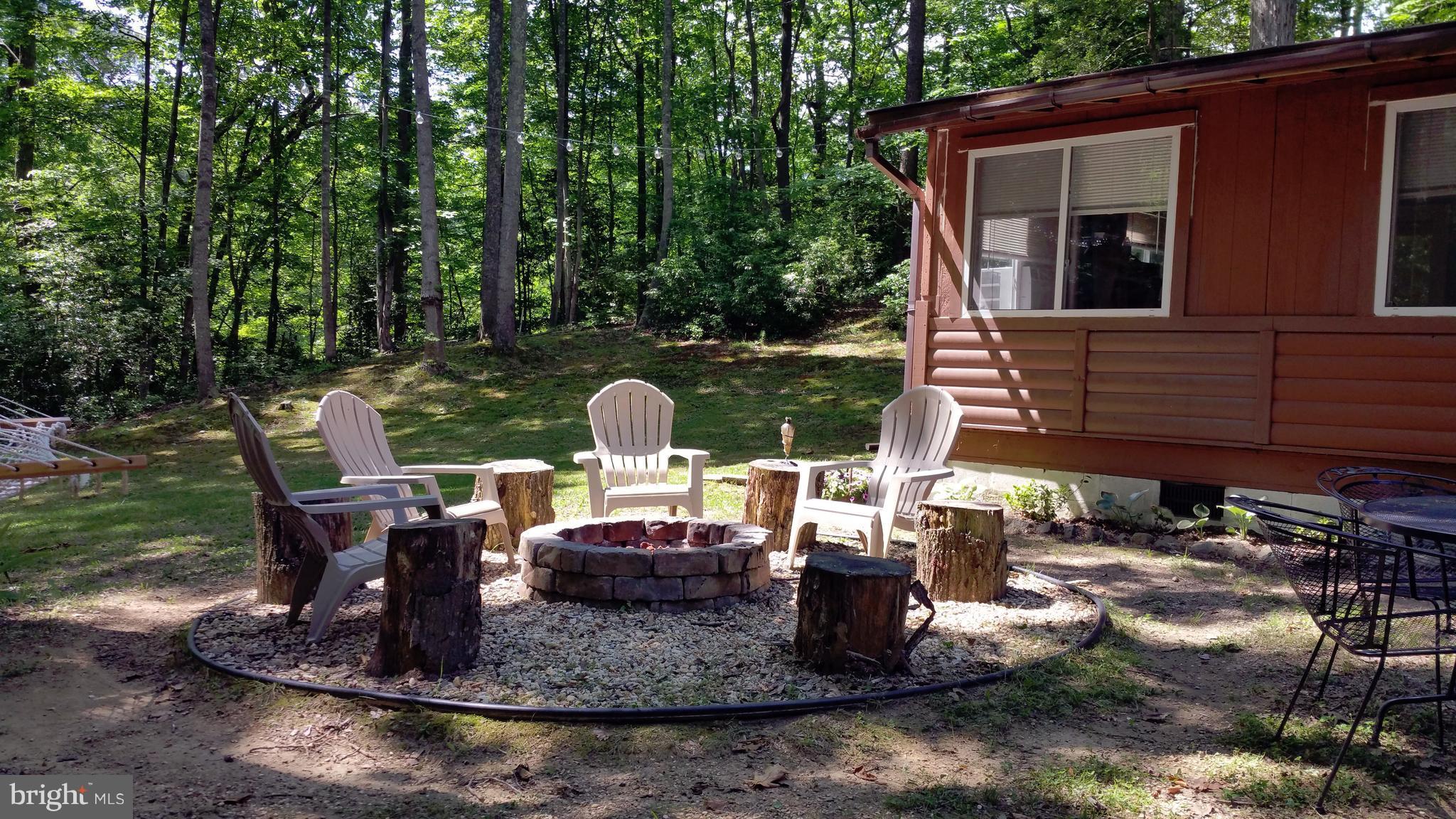 335 Maverick Road Lusby, MD 20657 - Photo 26 of 30 Fire pit out back.