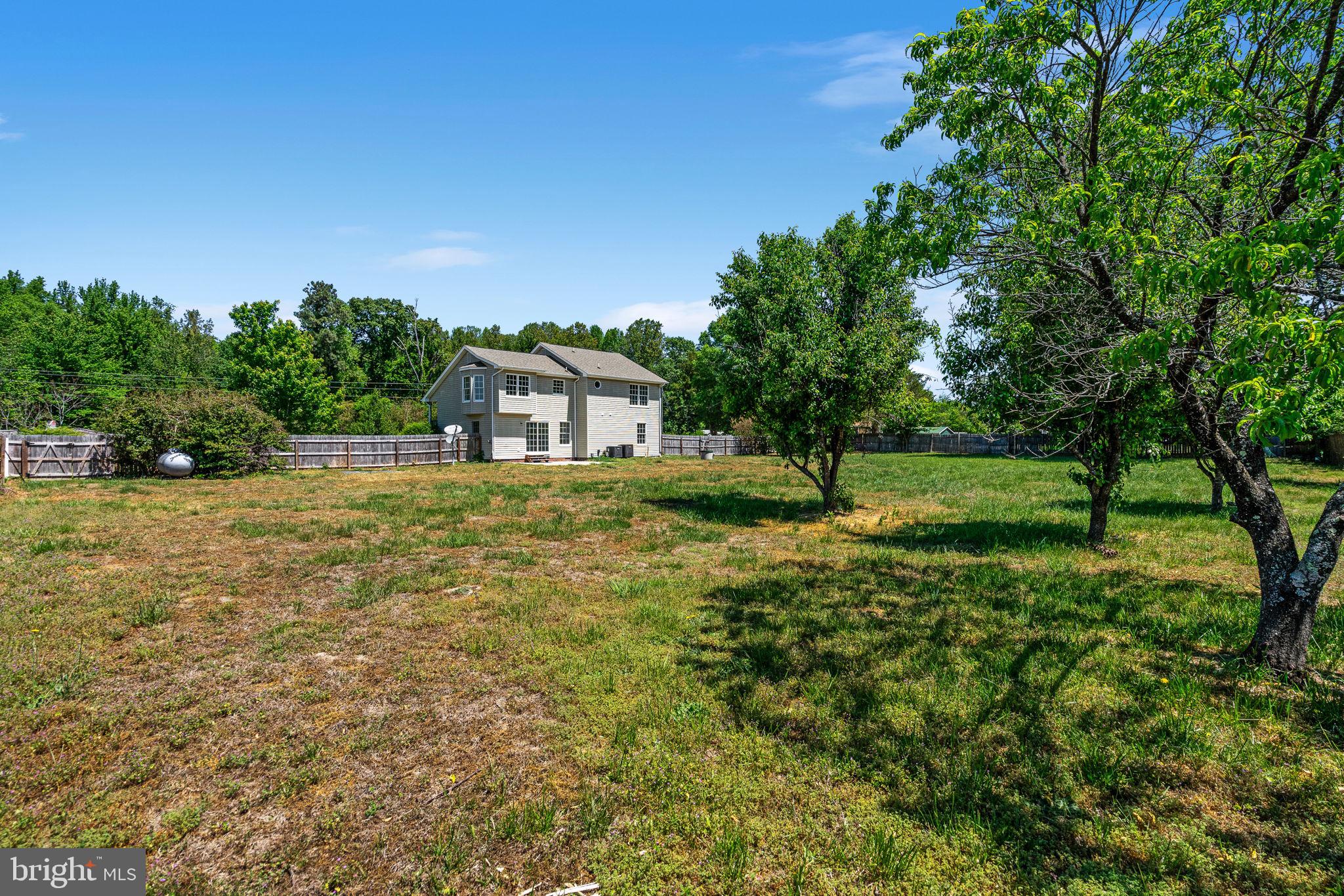 16456 Antioch Road Milford, VA 22514 - Photo 25 of 27 a view of a house with a yard