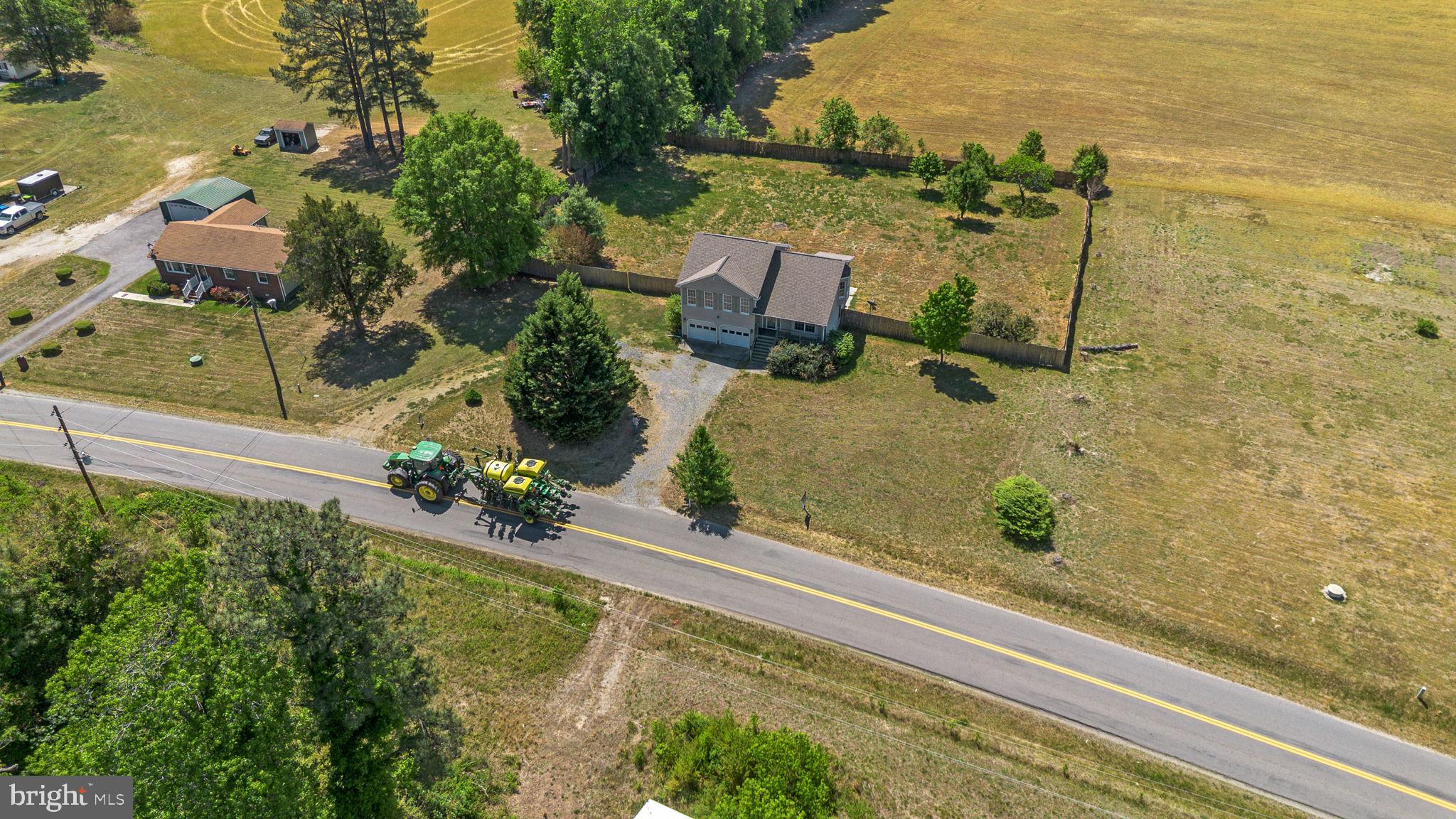 16456 Antioch Road Milford, VA 22514 - Photo 6 of 27 an aerial view of a house with a ocean view
