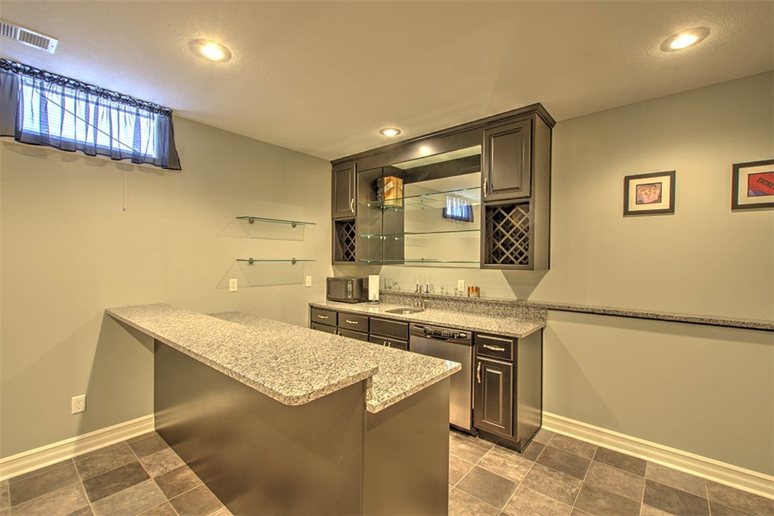 6625 Sherry Court Decatur, IL 62521 - Photo 28 of 42 a kitchen that has a sink and a stove in it