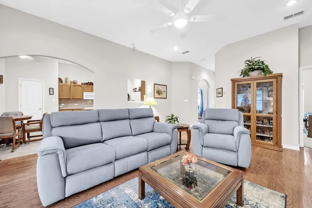 a kitchen with stainless steel appliances granite countertop a stove and a sink