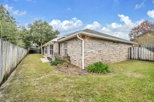 a view of a garage with a car and a car