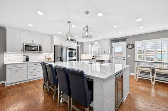 a bedroom with a bed and a table