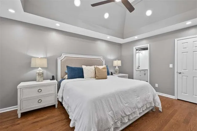 a bathroom with a shower and toilet