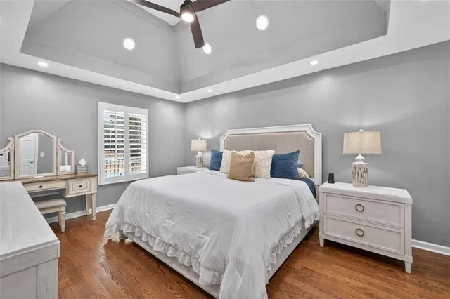 a spacious bathroom with a double vanity sink and a mirror
