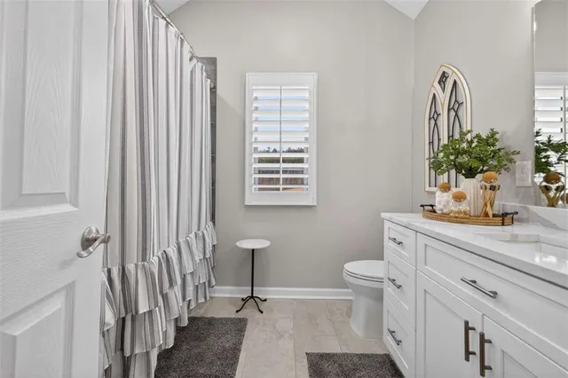 a view of a swimming pool with a yard