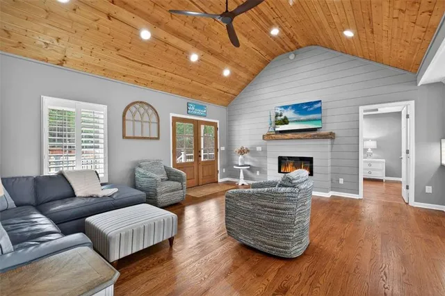 a large kitchen with a table and chairs