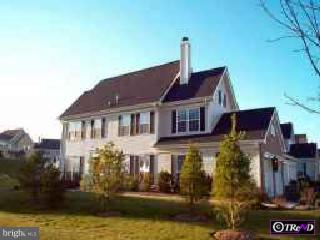 351 Watkins Road Pennington, NJ 08534 - Photo 1 of 1 a front view of a house with a garden