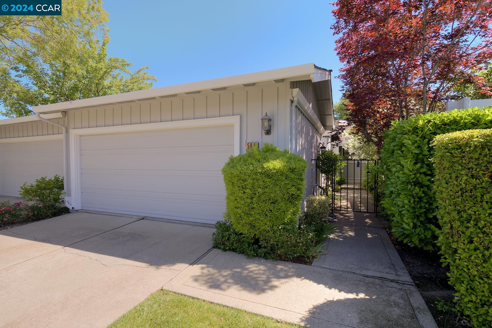 a view of a back yard of the house
