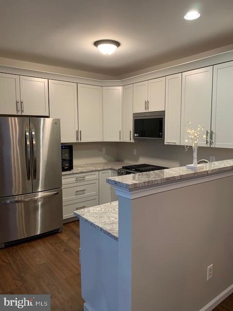 501 Buchanan Road Perkasie, PA 18944 - Photo 16 of 56 a kitchen with granite countertop a refrigerator and a stove