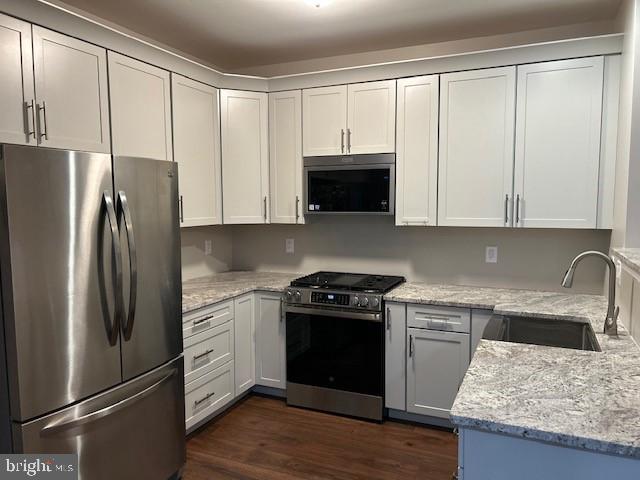 501 Buchanan Road Perkasie, PA 18944 - Photo 17 of 56 a kitchen with a refrigerator stove and sink