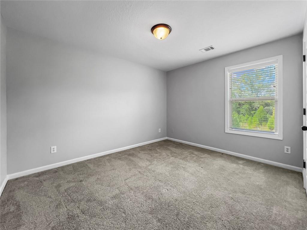 6 Pebblebrook Lane Fort Mitchell, AL 36856 - Photo 26 of 48 Carpeted empty room featuring baseboards