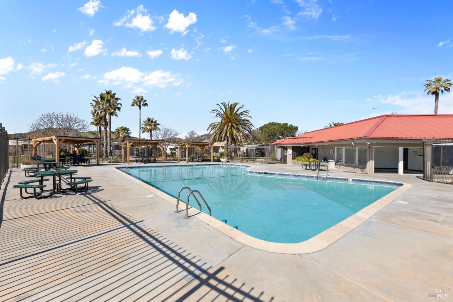 363 Glacier Way San Rafael, CA 94903 - Photo 18 of 20 a swimming pool with outdoor seating and yard
