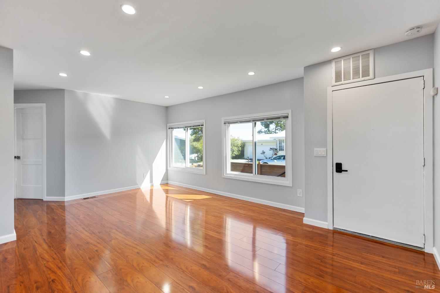 363 Glacier Way San Rafael, CA 94903 - Photo 6 of 32 Living room looking out to deck.