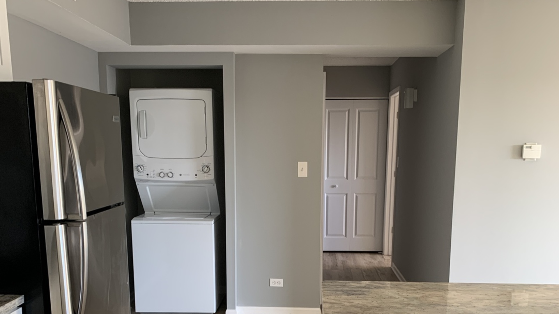 8141 84th Place, Unit 2D Justice, IL 60458 - Photo 11 of 19 a utility room with dryer and washer