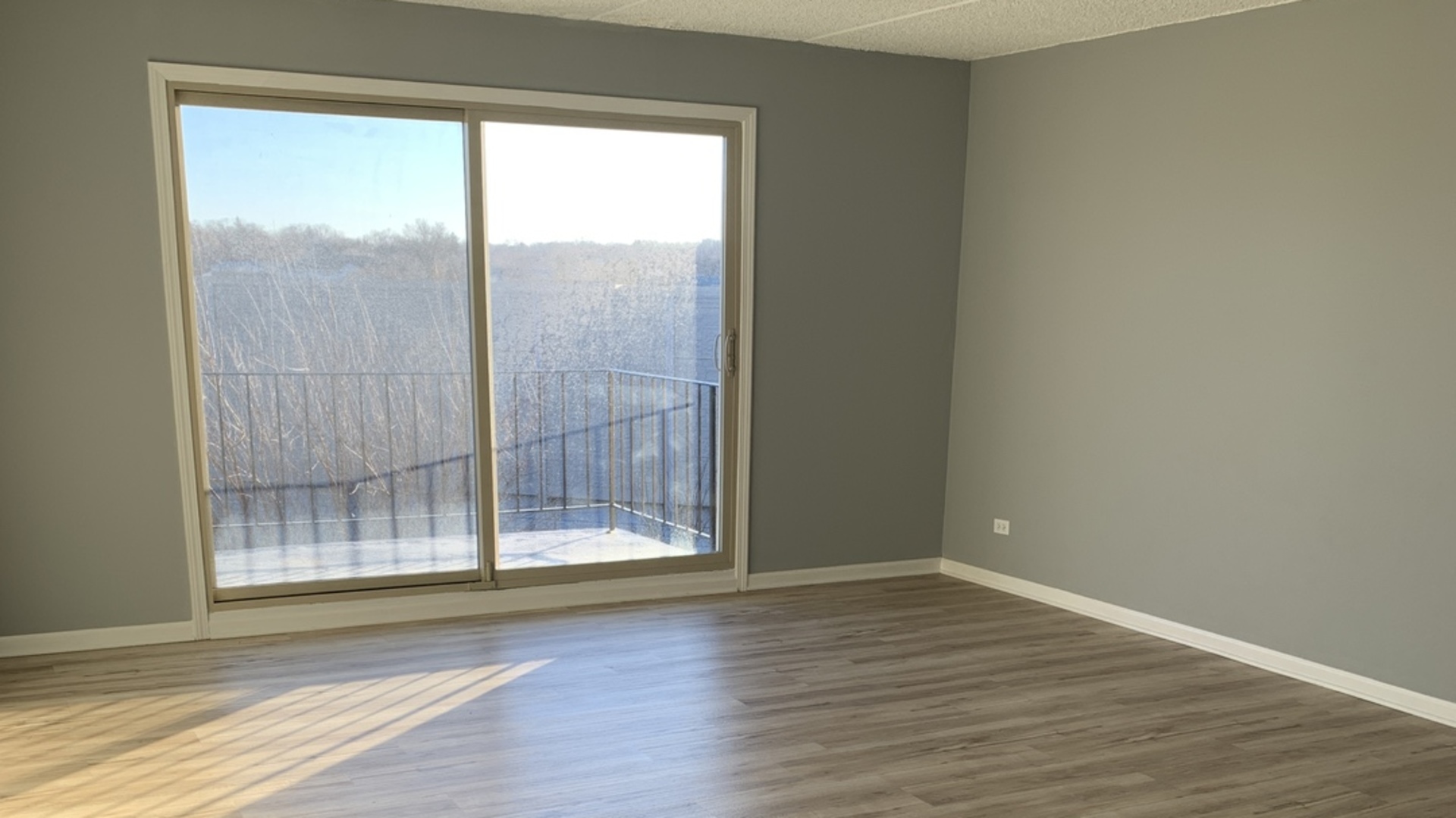 8141 84th Place, Unit 2D Justice, IL 60458 - Photo 4 of 19 a view of wooden floor and brick walls