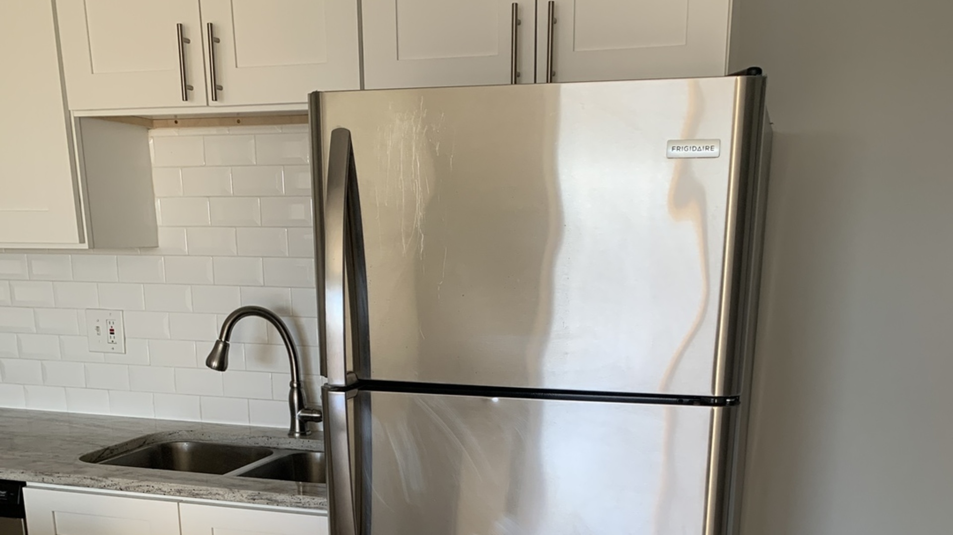 8141 84th Place, Unit 2D Justice, IL 60458 - Photo 7 of 19 a close view of a sink and refrigerator
