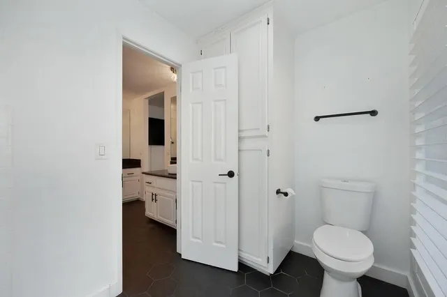 a view of a porch with wooden floor and outdoor space