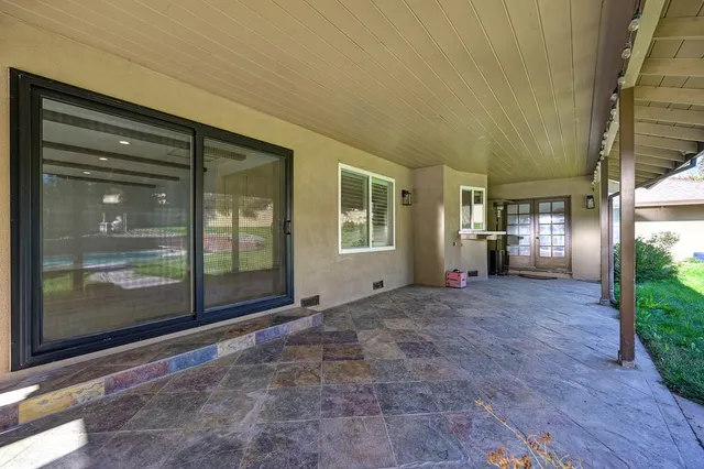 a view of yard with swimming pool