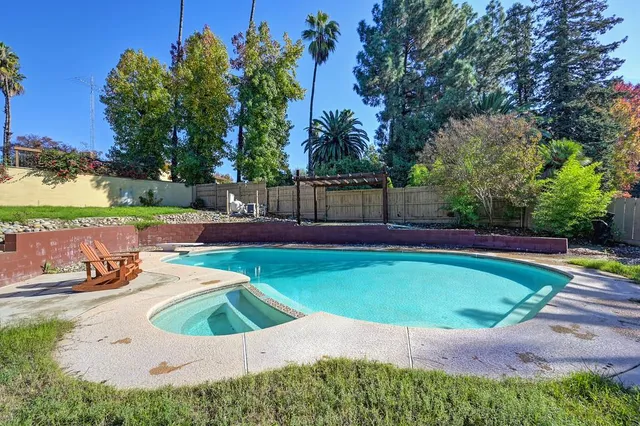 a view of a backyard with a slide