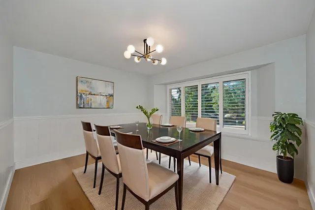 a view of a room with a large window