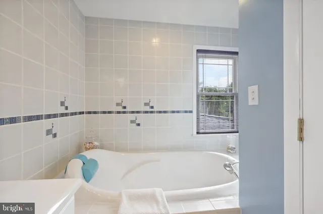 a bathroom with a bathtub