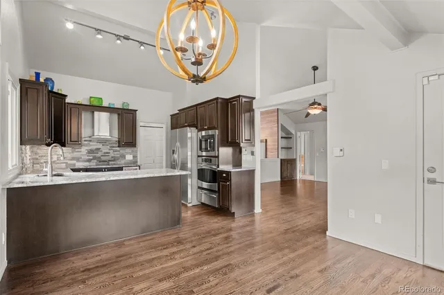 a view of kitchen and sink