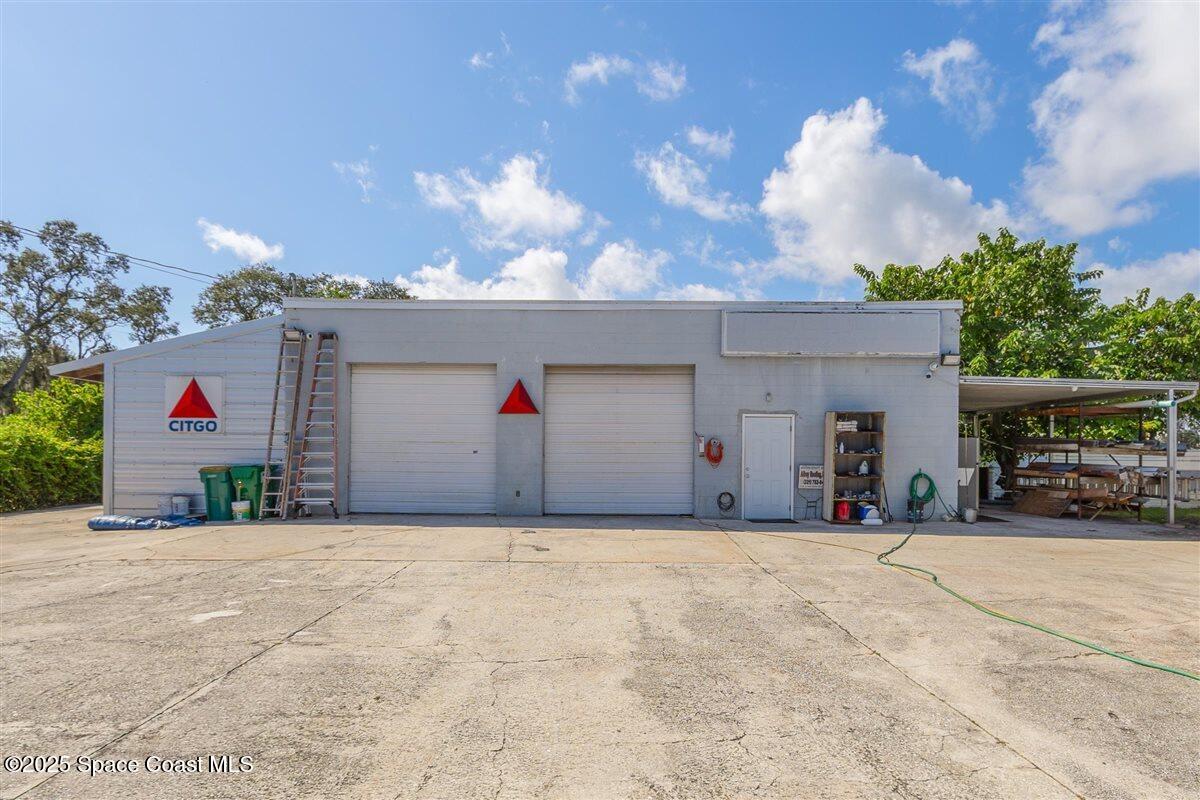 2015 Aurora Road Melbourne, FL 32935 - Photo 3 of 27 a view of a house with a outdoor space