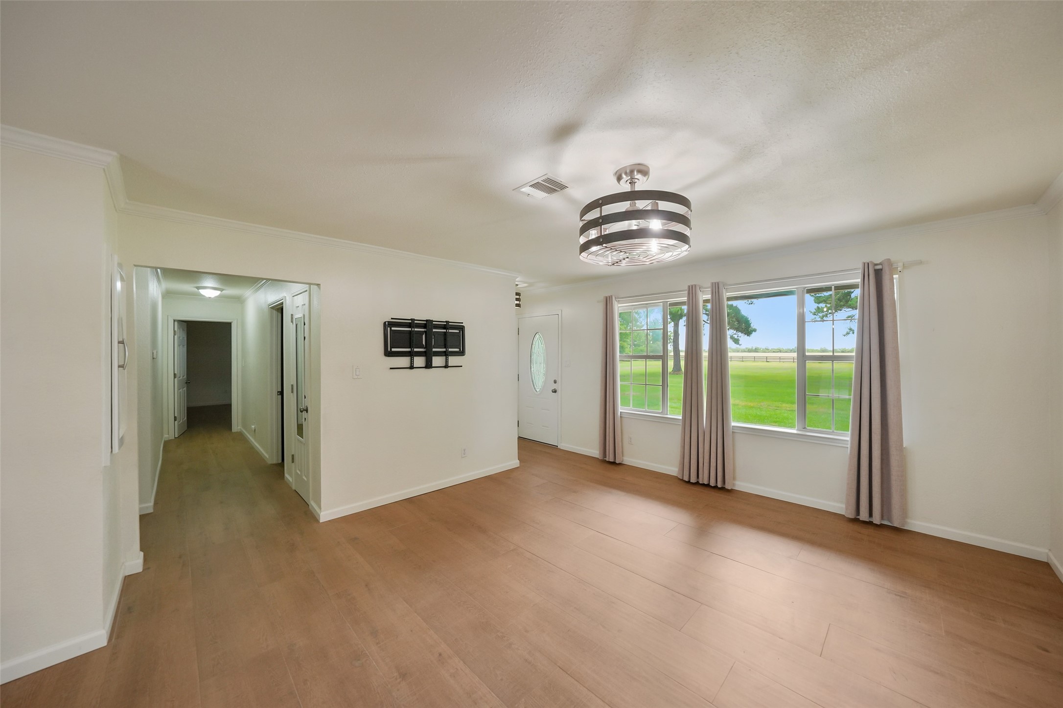 19635 Kermier Road Waller, TX 77484 - Photo 12 of 27 Bright living and dining areas with expansive windows overlooking the property.