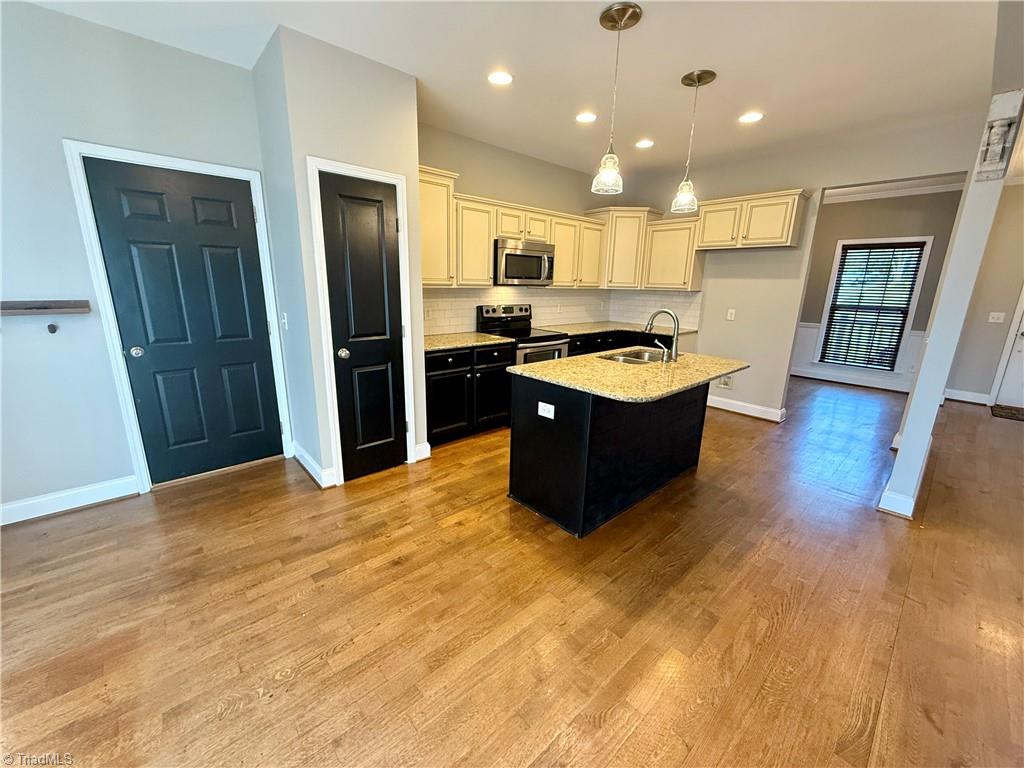 3403 Garrick Trace Browns Summit, NC 27214 - Photo 13 of 49 Kitchen with Breakfast Area