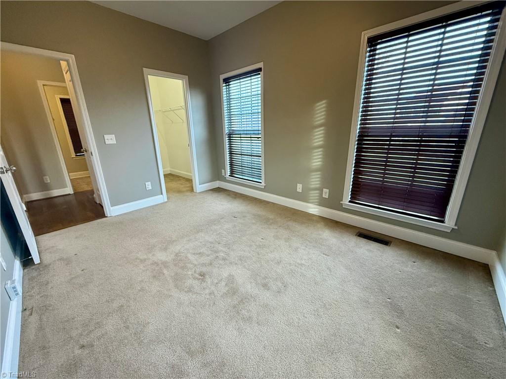 3403 Garrick Trace Browns Summit, NC 27214 - Photo 20 of 49 Main Level Bedroom with Walk-in Closet