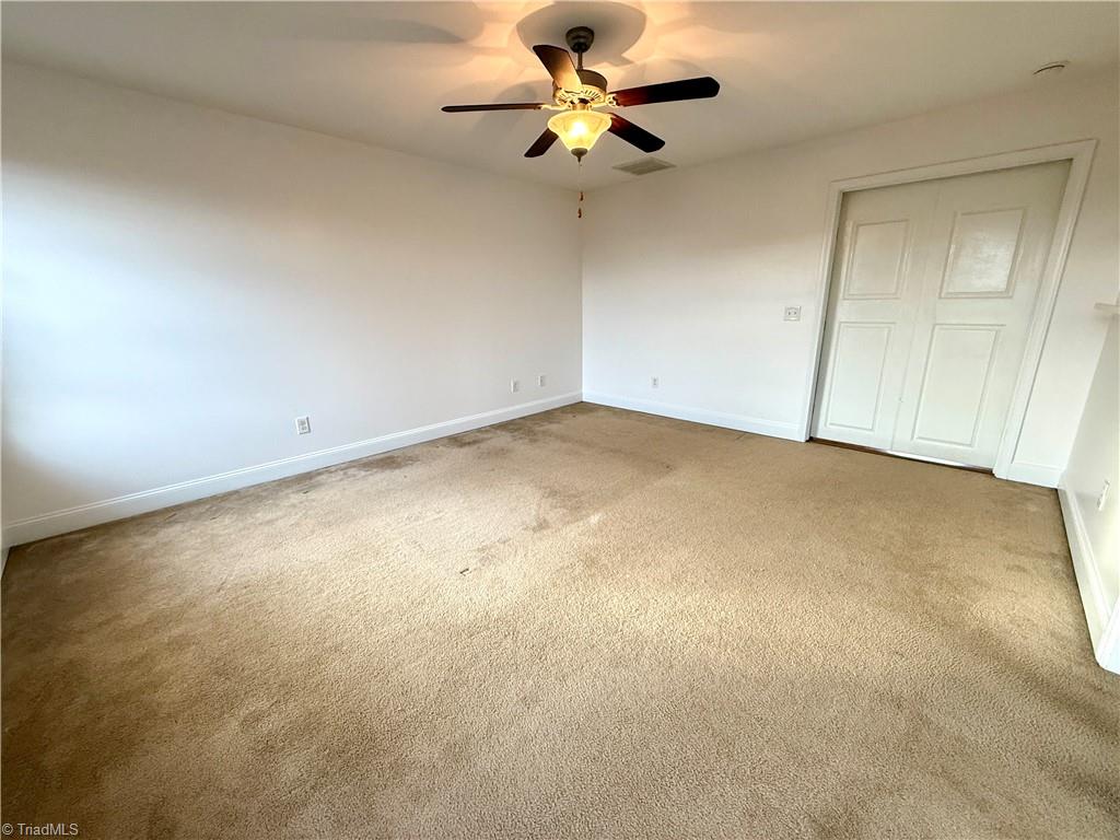 3403 Garrick Trace Browns Summit, NC 27214 - Photo 27 of 49 Primary Bedroom with Barn Door